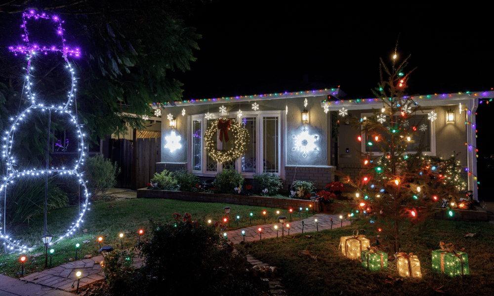House lit up with Christmas lights powered by solar.