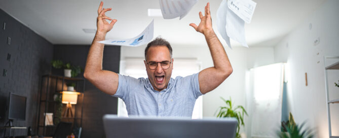 Homeowner celebrating lower power bills and energy control after switching to solar energy solutions with District Energy LLC